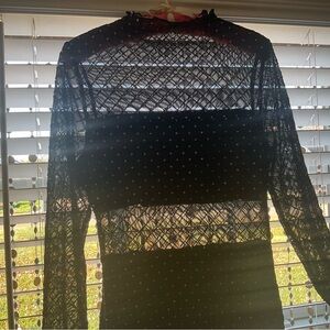 Gorgeous suttle black midi form fitting partially sheer